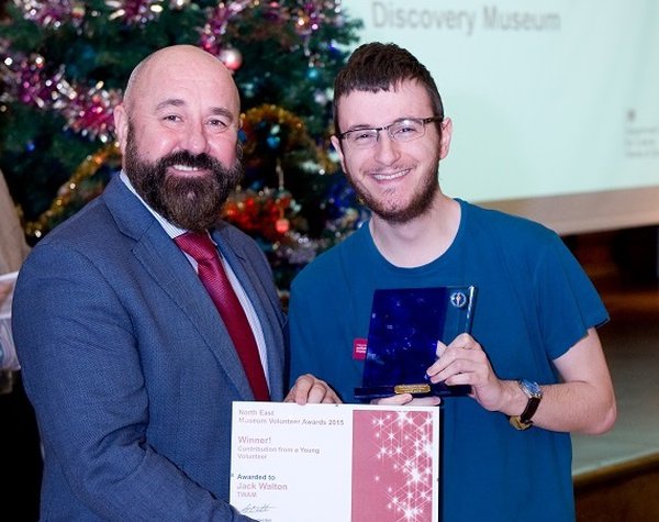 Councillor Ged Bell presents the Young Volunteer award to Jack Walton of Discovery Museum